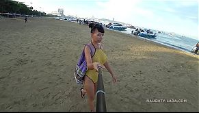 One piece mesh transparent swimsuit in public beach